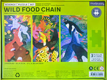 MudPuppy 'Wild Food Chain' science puzzle set box, featuring three colorful illustrated panels with animals and labels, on a bright lime green background.